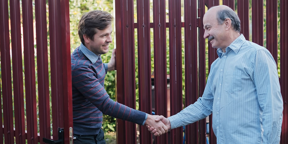 two people in a friendly handshake