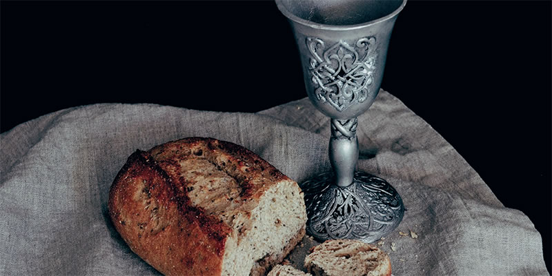 Bread and wine signifying the Body and Blood of Christ