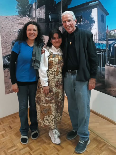 Fr. Bill and Cristina Coronado (left)