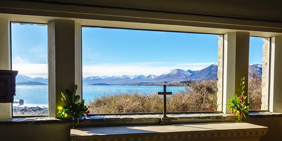 Windows overlooking a bay.