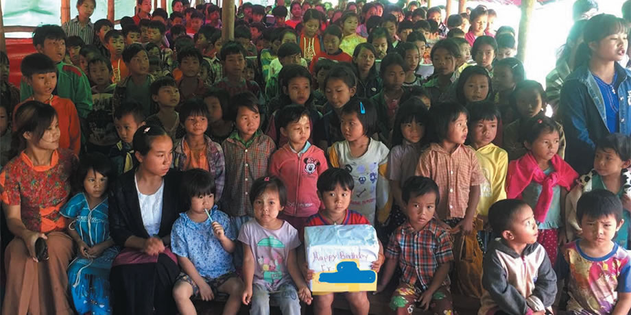 School children gather to say thank you