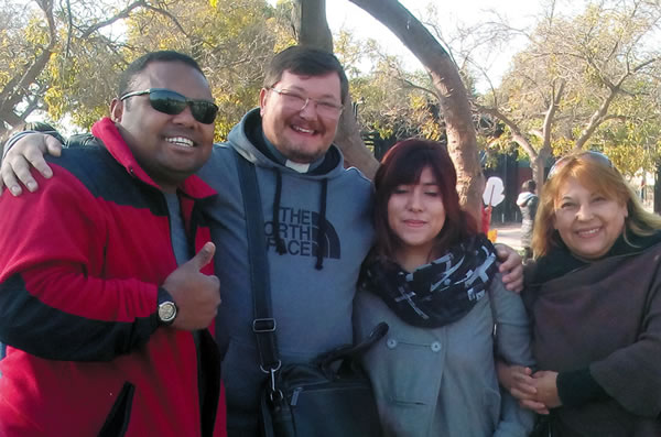 From left, Martin, Fr. Gonzalo and friends