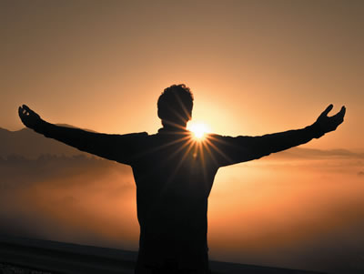 Man raising hands to God