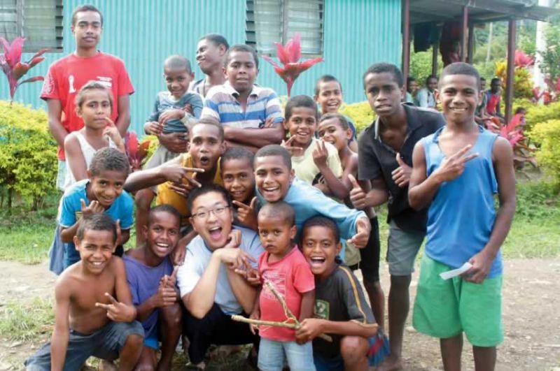 Andrew with new friends at Namosi village