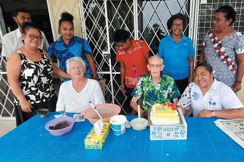 Fr. J.J. celebrates with cake