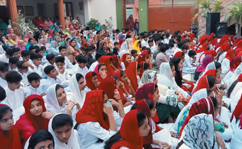 children seated at church ceremonies