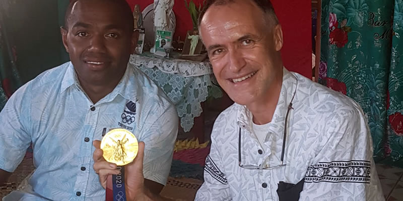 Olympian Waisea Nacugu (left) and Fr. Patrick Colgan