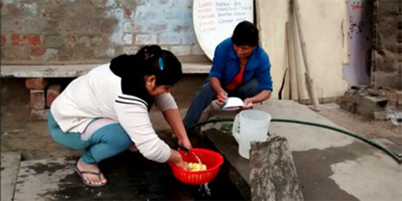 Volunteers preparing a meal at the soup kitchen.