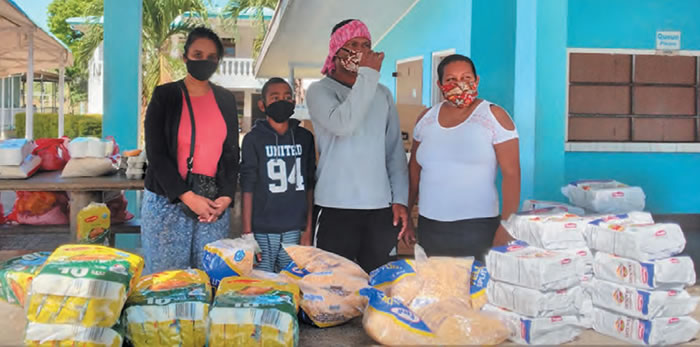 Staff preparing to distribute groceries