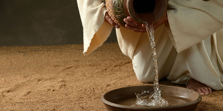 pouring water into a bowl