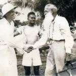 Fr. John Doyle with two parishioners