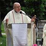 Fr. Duster reading the Gospel