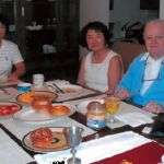 From left, Theresa's sister Agnes, Theresa and Fr. Sean Dunne