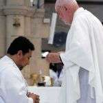 Fr. David Arms during the laying of hands