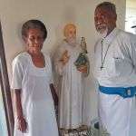 Parishioners with St. Columban statue