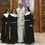 Fr. Bill Morton with visitors in Cuidad Juarez, Mexico