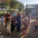 Children in the village of Mariam Nagar in their morning assembly. 