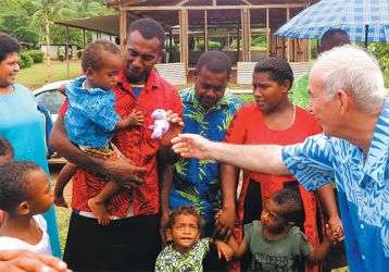 Columban Fr. Frank Hoare playing Santa Claus