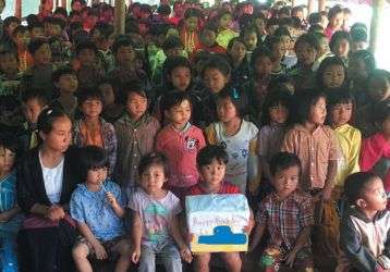 School children gather to say thank you