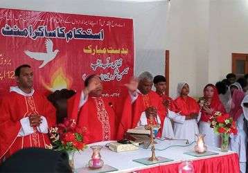 Bishop says Mass at St. John the Apostle Church